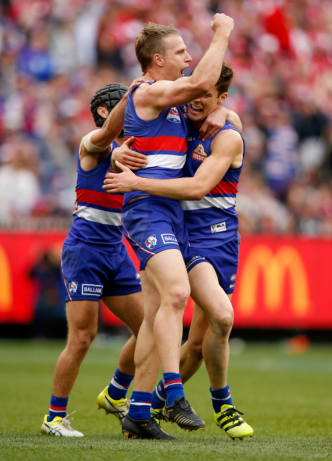 AFL 2016 Toyota AFL Grand Final - Sydney v Western Bulldogs MELBOURNE, AUSTRALIA - OCTOBER 01: Jake Stringer of the Bulldogs celebrates a goal during the 2016 Toyota AFL Grand Final match between the Sydney Swans and the Western Bulldogs at the Melbourne Cricket Ground on October 01, 2016 in Melbourne, Australia. (Photo by Justine Walker/AFL Media)